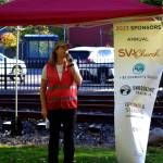 Danielle Cox, excutive director of Love Snoqualmie Valley, delivers a welcome speech at the Volunteer Day kick-off event at Railroad Community Park on Oct. 7. Photo Conor Wilson/Valley Record.
