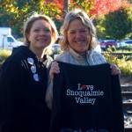 Snoqualmie Trading Co. Owners Heather Dean (left) and Cheri Buell sell Love Snoqualmie Valley merch at Volunteer Day. Half of the proceeds went back into the community, Dean said. Photos by Conor Wilson/Valley Record.