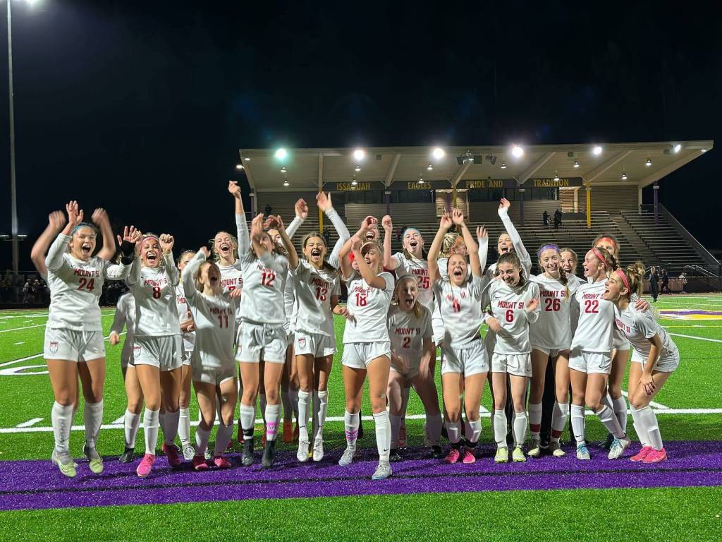 Photo courtesy of the Snoqualmie Valley School District. The Mount Si Girls Soccer team celebrates after a 2-1 victory over Issaquah on Nov. 2 sends them to the state playoffs.