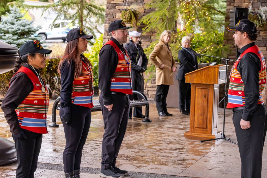 The Snoqualmie Tribe Honor Guard prepare for a flag raising ceremony on Nov. 11. (Photo by David Conger / davidconger.com)
