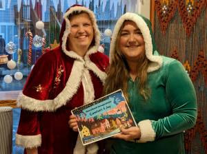 Storybook author Katie Podschwit, right, and Dorie Ross pose for a photo inside Snoqualmie Pie Co. (Photo by Conor Wilson/Valley Record)
Storybook author Katie Podschwit, right, and Dorie Ross pose for a photo inside Snoqualmie Pie Co. Photo Conor Wilson/Valley Record.