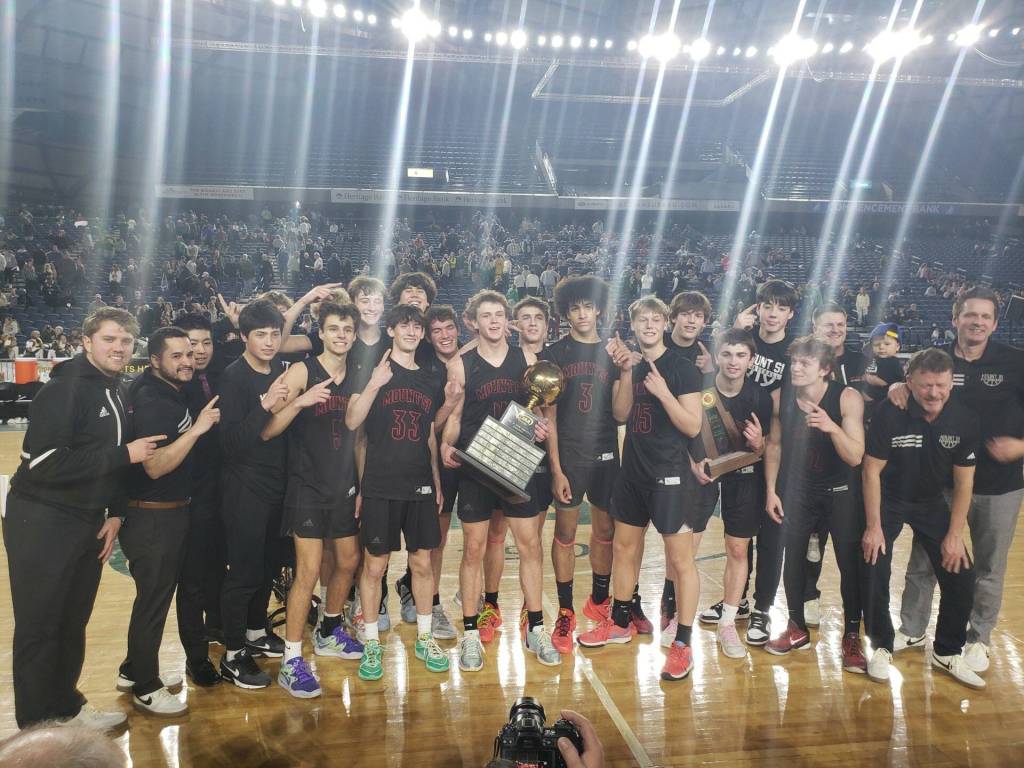 The Wildcats celebrate March 2 at the Tacoma Dome after winning the 4A state basketball championship. Courtesy photo