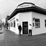 Cook and his wife Lisa Cook standing outside the renovated building, which now serves as the Cook Real Estate office. (Photo courtesy of David Cook)