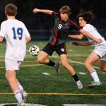 Mount Sis Zach Ellis battles for the ball April 12 vs. Bothell. Photos courtesy of Calder Productions