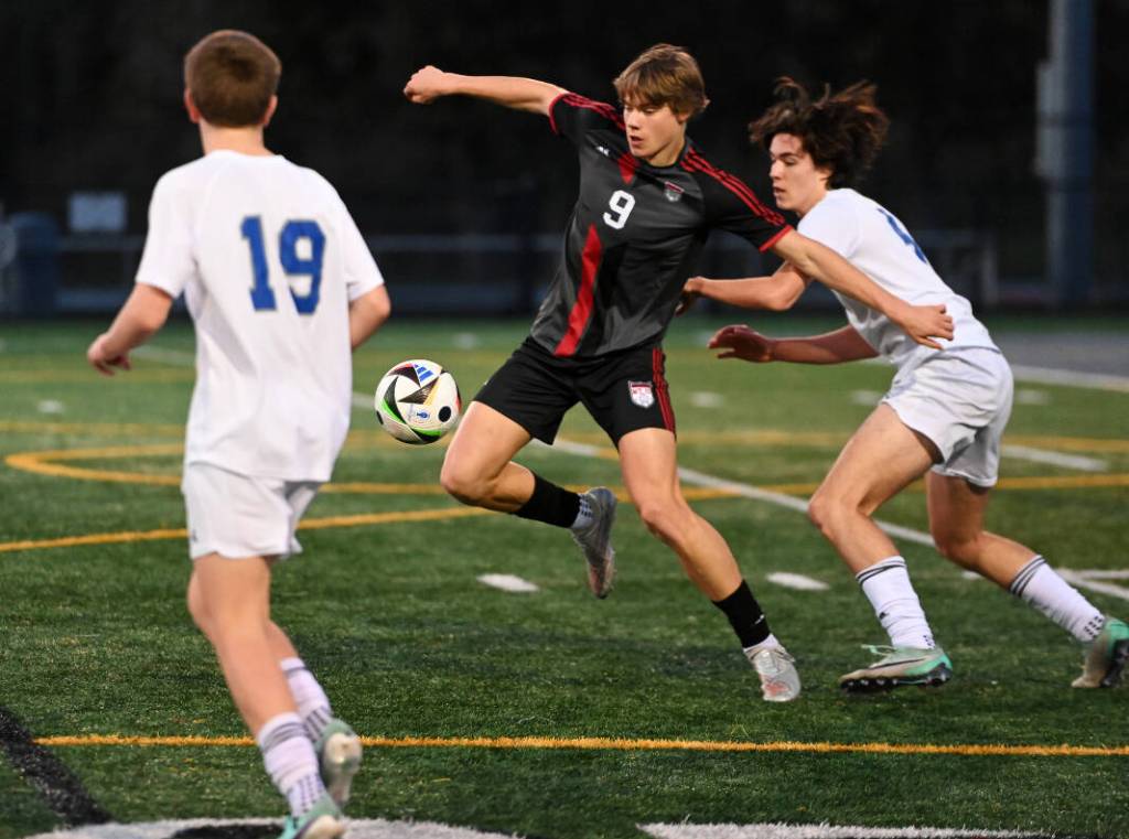 Mount Sis Zach Ellis battles for the ball April 12 vs. Bothell. Photos courtesy of Calder Productions