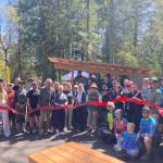 North Bend Mayor Mary Miller cut the ribbon at Tennant Trailhead Park on April 19. (Photo by Mallory Kruml/Valley Record)