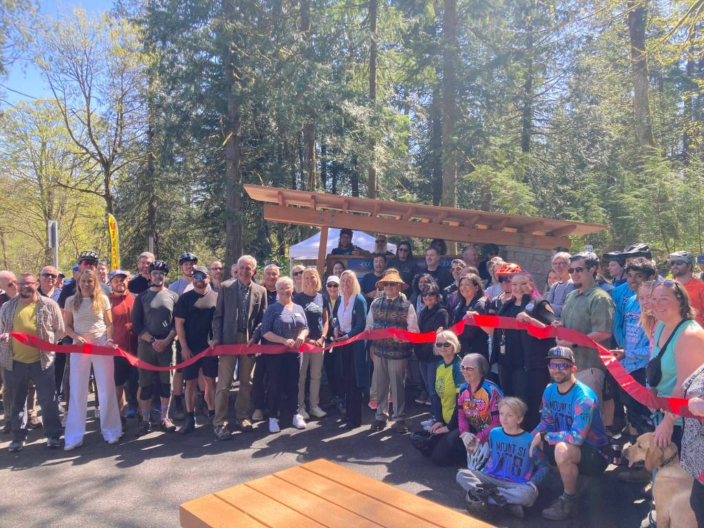 North Bend Mayor Mary Miller cut the ribbon at Tennant Trailhead Park on April 19. (Photo by Mallory Kruml/Valley Record)