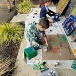 Troop 425 Scouts painting bird houses and feeders for the Fall City Art Park. (Photo courtesy of Kyle Sundet)