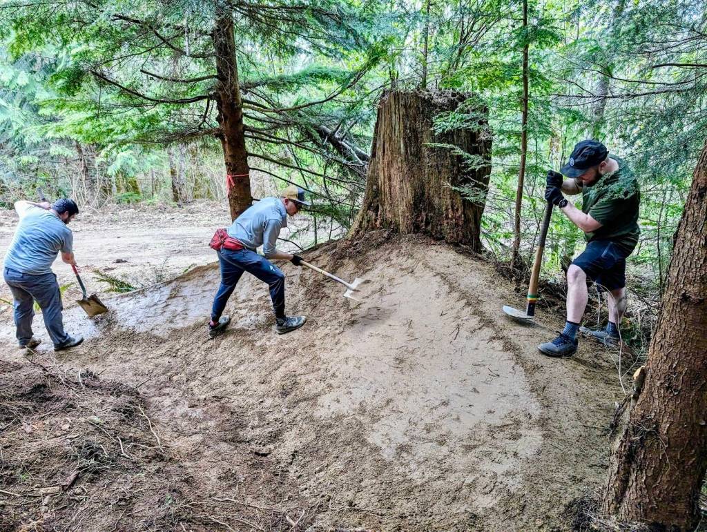 Evergreen Mountain Bike Alliance trail builders working on the soon-to-be-open Raging River trail system. Courtesy photo