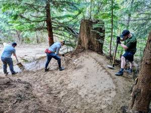 Evergreen Mountain Bike Alliance trail builders working on the soon-to-be-open Raging River trail system. Courtesy photo