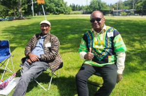Volunteers enjoy the sunshine at Rentons 2024 Juneteenth Celebration. The weather will be sunny this weekend as summer officially starts. Photo by Bailey Jo Josie/Sound Publishing
