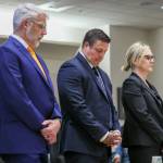 Auburn Police Officer Jeffrey Nelson, flanked by attorneys, stands as two guilty verdicts are handed down June 27 at the King County Maleng Regional Justice Center in Kent. (Ken Lambert / The Seattle Times / Pool)
