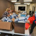 Photo by Kelly Coughlin
Business owners dropping off gifts for teachers.