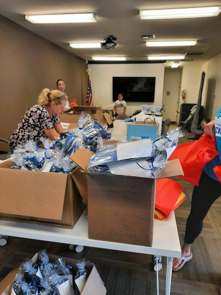 Photo by Kelly Coughlin
Business owners dropping off gifts for teachers.