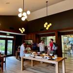 Carnation Farms staff members gather with their family and friends at the Farmview Kitchens soft opening Aug. 14, 2024. Photo by Grace Gorenflo/For the Valley Record