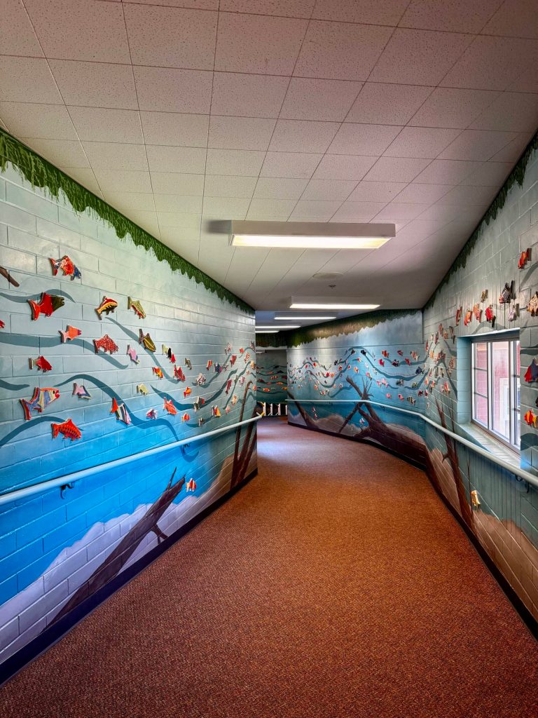 An interior hallway at Carnation Elementary is wrapped in a new salmon mural. Photos by Grace Gorenflo/For the Valley Record