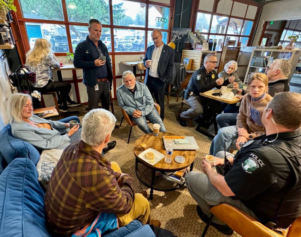 Photos courtesy of the city of North Bend
Snoqualmie Police Chief Brian Lynch speaks with community members at a Sept. 17 Chat with the Chief event at Arete Coffee Bar in North Bend.