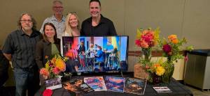 Owners of Millers stand with friends at the King County Executives Small Business Awards ceremony Oct. 7, 2024. From left: Paul Hanover, Jules Hughes, Millers co-owner Bill Pritchard, Millers co-owner Nancy Colton and Gregory Jamiel. (Courtesy of Nancy Colton)