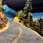 A Feather River scenic overlook sign sits on an artificial road. The Feather River Route takes trains through the Sierra Nevada. (Grace Gorenflo/Valley Record)