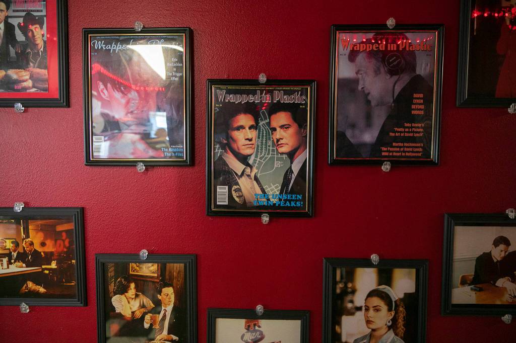 Twin Peaks photos and memorabilia cover the walls at Twedes Cafe in North Bend. (Ryan Berry / Sound Publishing)