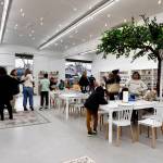 Friends, family and neighbors gather to celebrate the opening of the Snoqualmie location of Art Major Studios Dec. 5, 2024. (Grace Gorenflo/Valley Record)