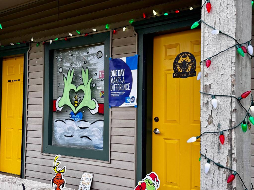 Queen Bee Estheticss holiday windowscape includes a Duvall-themed take on the town of Whoville from The Grinch. (Grace Gorenflo/Valley Record)