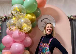 Ashley James stands for a photo at the grand opening of her new makerspace, Works from the heART, Dec. 7, 2024. (Grace Gorenflo/Valley Record)