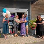 Snoqualmie Mayor Katherine Ross (left) and SnoValley Chamber of Commerce CEO Kelly Coughlin (right) attended the ribbon cutting along with the three owners David and Meghan Schumacher and Ally Thompson (middle). File photo