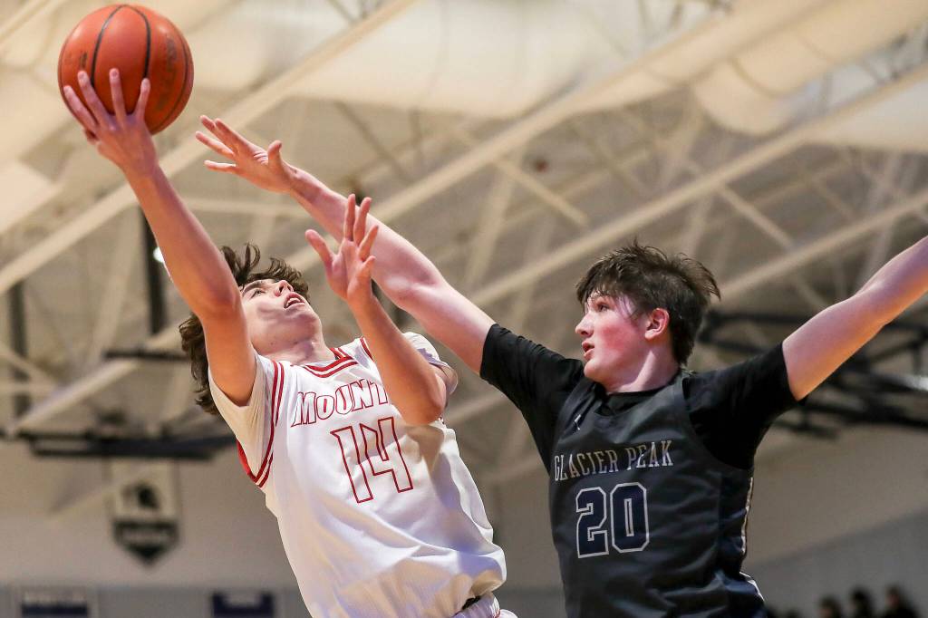 Mount Si’s Marcus Heide (14) shoots the ball during a boys Class 4A bi-district title game between Glacier Peak and Mount Si at North Creek High School on Friday, Feb. 16, 2024 in Bothell, Washington. The Wildcats won, 59-53. (File photo)