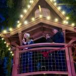 Aroma Coffee Co. co-owner Emily Ridout, joined by Pete and Judy Nelson, speaks to the crowd at the grand opening of Petes Treefort Dec. 7, 2024. Grace Gorenflo/Valley Record