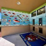 Ceramic fish swim past the front door of Carnation Elementary. Photo by Grace Gorenflo/For the Valley Record