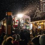 Mayor Katherine Ross arrives with Santa Claus during the Snoqualmie Winter Lights celebration on December 7, 2024, in Snoqualmie, Washington. (Photo by Henry Rodenburg)