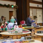Volunteers unload and organize toys at the 2024 Giving Tree shop. Photo courtesy of Carolyn Malcolm