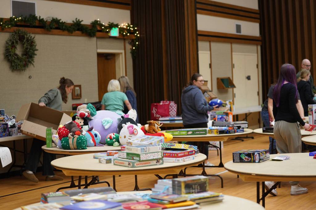 Volunteers unload and organize toys at the 2024 Giving Tree shop. Photo courtesy of Carolyn Malcolm