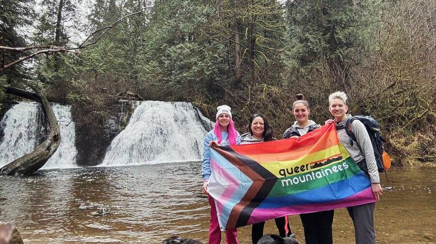 Attendees of a Queer Mountaineers hike at Cherry Creek Falls in Duvall in 2024. Photo courtesy of Queer Mountaineers