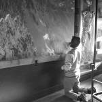 Scott Rinckenberger installs his photo mural at Volition Brewing Co. Photo courtesy of Scott Rinckenberger