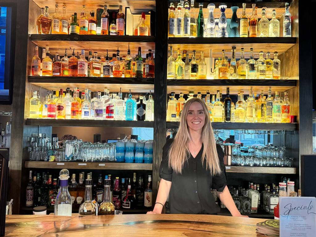 Marta Rothnie, owner of Anejo Tequila Bar, stands for a photo behind the bar Jan. 31, 2025. Grace Gorenflo/Valley Record