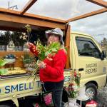 Erin Barzen, owner of Barzens Blooms, crafts floral arrangements at her ribbon cutting ceremony, Feb. 14, 2025. Grace Gorenflo/Valley Record