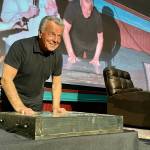 Grace Gorenflo/Valley Record 
Actor Ray Wise, who played Leland Palmer in Twin Peaks, imprints his hands in a block of wet concrete at the North Bend Theatre, Feb. 22, 2025. The concrete block will be added to the sidewalk outside the theater.
