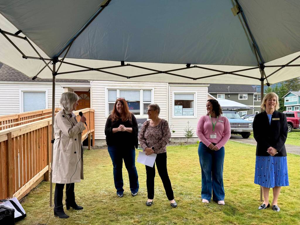 North Bend Mayor Mary Miller speaks at the Snoqualmie Valley Healing Center ribbon-cutting ceremony March 12, 2025. From left: Miller; SnoValley Chamber CEO Kelly Coughlin; Chaplain Patti Yetneberk; CarePoint Clinic Executive Director Misty Messer; Snoqualmie Mayor Katherine Ross. (Grace Gorenflo/Valley Record)