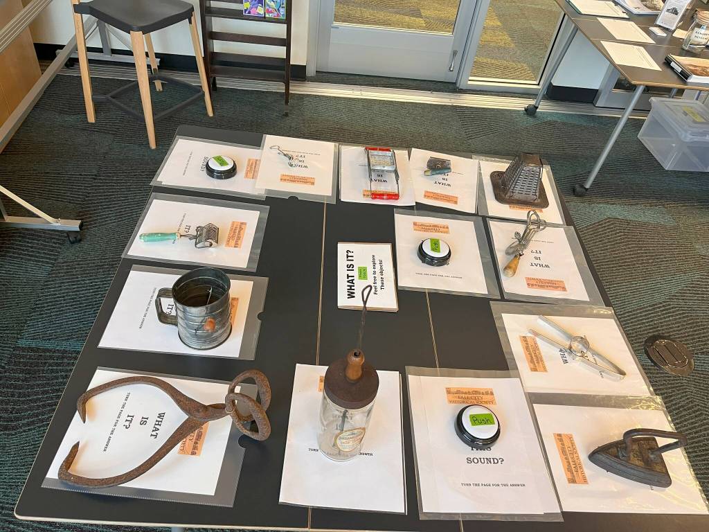 The What is it? table at the 2025 Fall City Historical Society pop-up museum. Photo courtesy of Cindy Parks