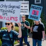 Marchers walk through downtown Duvall during the Hands Off! protest April 5, 2025. Photo courtesy of Travis Wetherbee/Last Lite Photography
