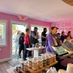 Customers wait in line to try Mooo! Ice Cream on opening day April 5, 2025.