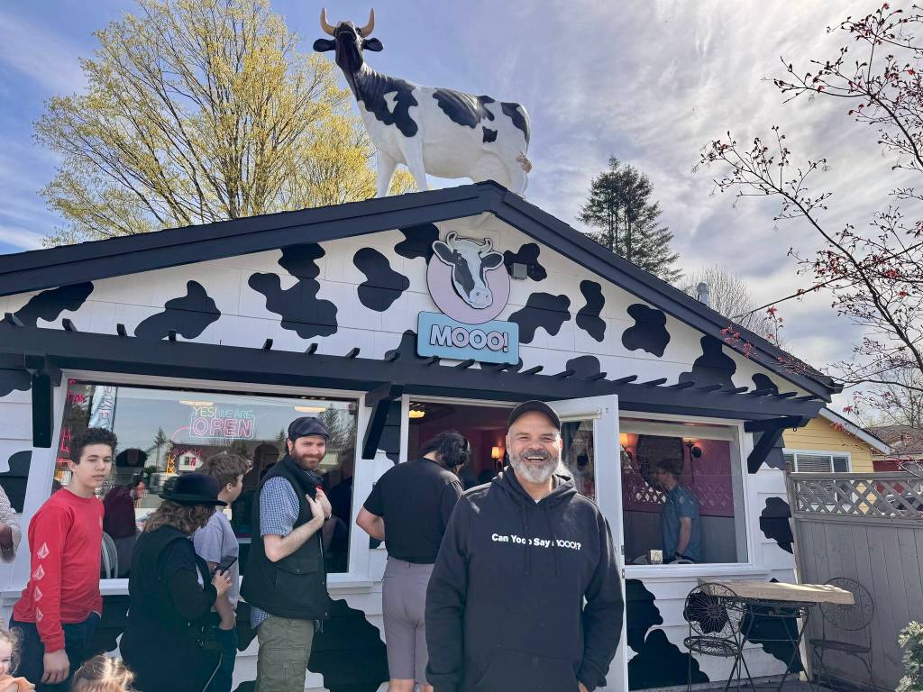 Owner Larry Brown stands outside Mooo! Ice Cream during its grand opening April 5, 2025. (Grace Gorenflo/Valley Record)