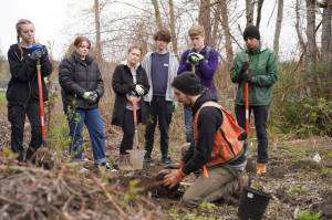 Volunteers at an Earth Day Event co-hosted by the Snoqualmie Tribe and Mount Si Green Team pose for a photo. Photo courtesy of the Snoqualmie Valley School District