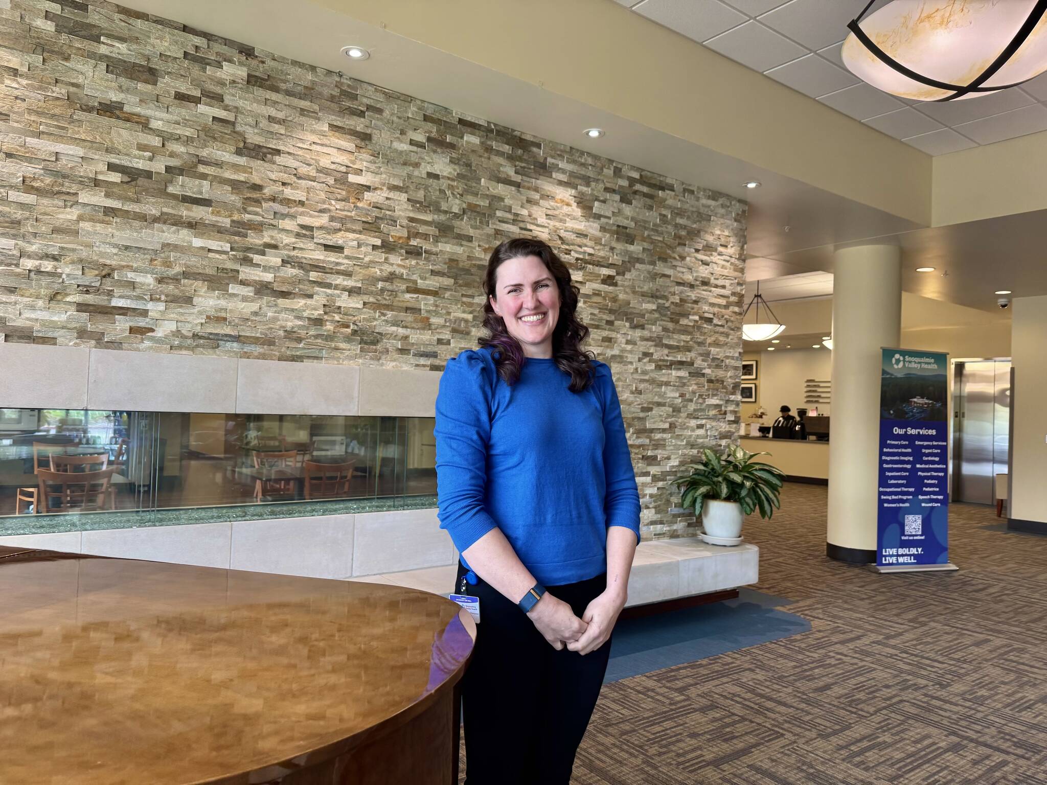 Katherine Thompson, Snoqualmie Valley Assault Treatment Services program manager, stands for a photo at Snoqualmie Valley Health hospital, April 11, 2025. Grace Gorenflo/Valley Record