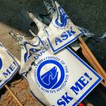 The notable ask me signs that Friends of the Issaquah Salmon Hatchery fish docents carry were melted in the April 22 fire. Photo courtesy of Friends of the Issaquah Salmon Hatchery