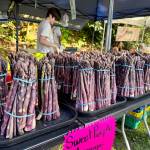 Fresh purple asparagus is for sale at the Duvall Farmers Market, May 1, 2025. (Grace Gorenflo/Valley Record)