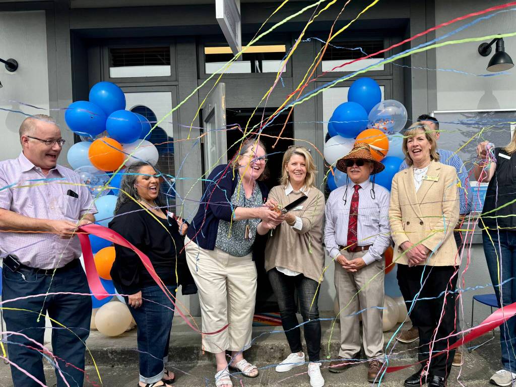 Staff and board members of Reclaim celebrate their ribbon cutting May 8, 2025. (Grace Gorenflo/Valley Record)