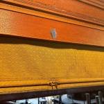 An original window shade in parlor car 1049, April 29, 2025. (Grace Gorenflo/Valley Record)